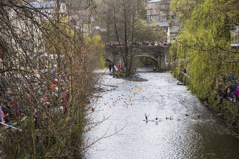 Crowds lined the river to watch Hebden Bridge Duck Race.