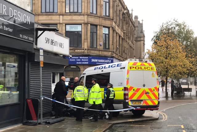 Police on Commercial Street in Halifax town centre this morning