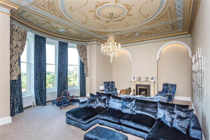 The family lounge, with ornate ceiling decoration, and stunning views from the windows.