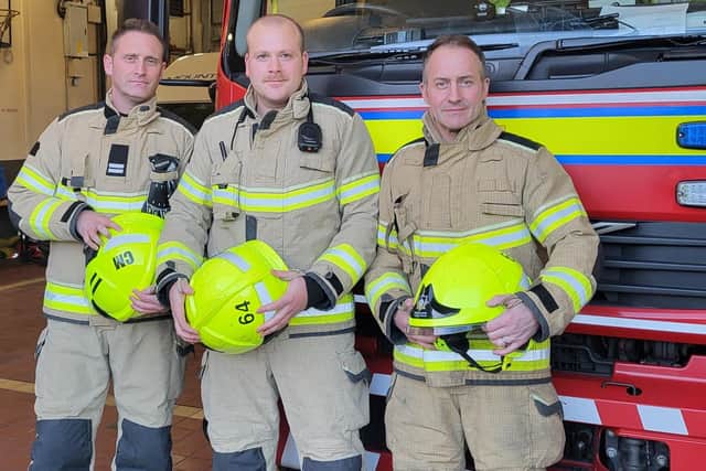 From left, firefighters Neal Andrews-Parry, James Barker and Damian Lord who helped to save a new-born puppy from a house fire in Halifax