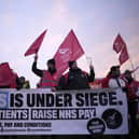 Striking ambulance workers on a picket line last month. (Photo by Christopher Furlong/Getty Images)