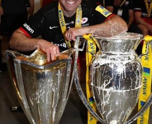 Charlie Hodgson with the winning Premiership trophy and European Cup at his last match for Saracens in 2016