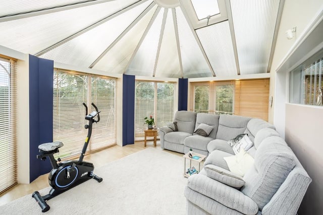 The conservatory provides bright and versatile space.