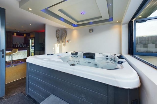 There's dedicated space for a hot tub within the garden room.