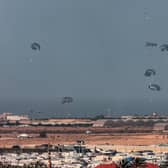 A Jordanian military aircraft drops humanitarian aid over Rafah and Khan Yunis in the skies of the southern Gaza Strip. Photo: Getty Images