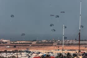 A Jordanian military aircraft drops humanitarian aid over Rafah and Khan Yunis in the skies of the southern Gaza Strip. Photo: Getty Images