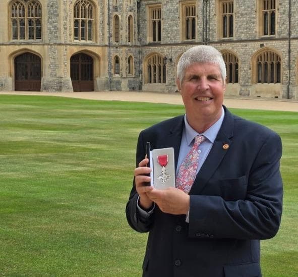 Neil Davidson Rbs Halifax 'Miracle Man' Neil Davidson collects MBE at Windsor Castle