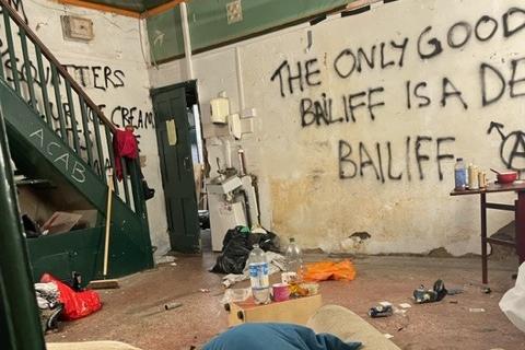 Abusive graffiti covers every wall
