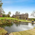 The picturesque setting of the stone built property with 3.5 acres.