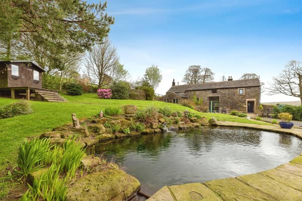 The picturesque setting of the stone built property with 3.5 acres.