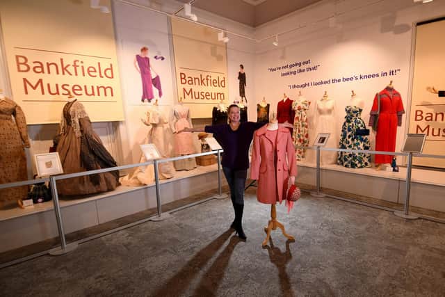 Fashion historian Lucy Adlington with 1971 'going away' outfit at her exhibition Opening the Wardrobe at Bankfield Museum, Halifax. Picture by Simon Hulme.