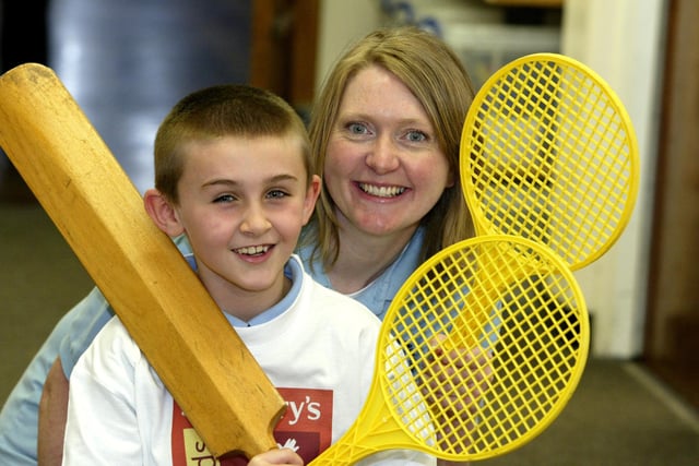 Teaching assistant at Cross Lane school, Elland, Caroline Trigg, pictured with Jack Gibson, 8, in 2006. Jack brought her an entry form for a Sainsbury's sports equipment competition and she won the £10,000 prize.