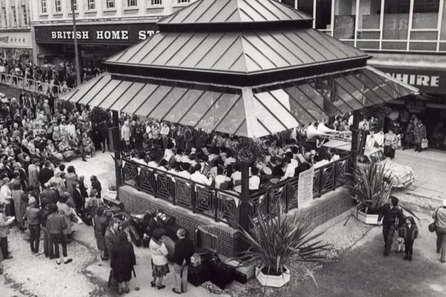 The Moor in Sheffield where shoppers gathered and listened to music playing at the bandstand in 1983