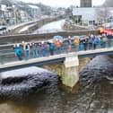 People gather for the official opening of the footbridge in Mytholmroyd