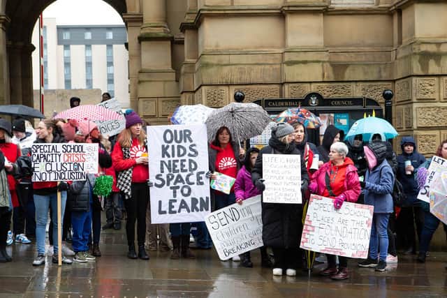 Parents gathered at Halifax Town Hall to protest at lack of special school places for SEND children