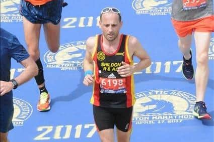 Jon running the Boston marathon in 2017