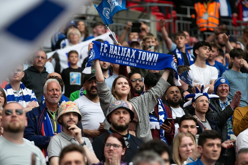 Town fans celebrate their victory at Wembley.