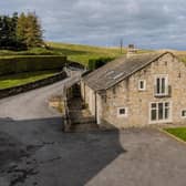 This detached Grade II listed barn conversion is on the market for offers over £795,000.