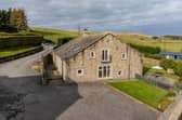 This detached Grade II listed barn conversion is on the market for offers over £795,000.