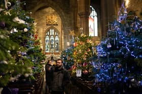 People enjoy the Halifax Minster Christmas Tree Festival