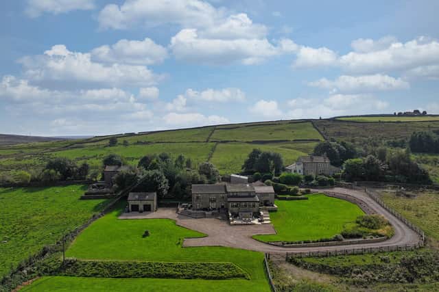 Buckley Green Bottom Farm is a recently renovated four-bedroom property with 8.7 acres of land.  Situated in Stanbury, Bradford, it is for sale at £1.69m - offers over.