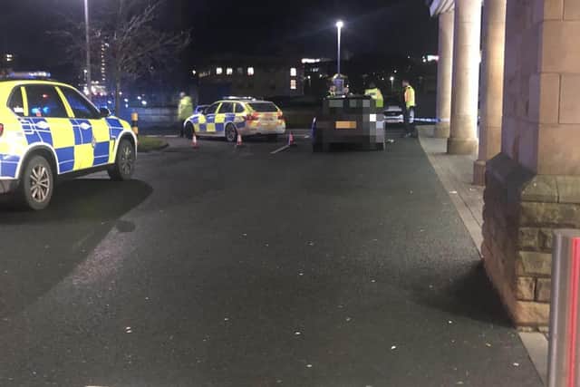 Police in the car park of Lidl in Halifax last night