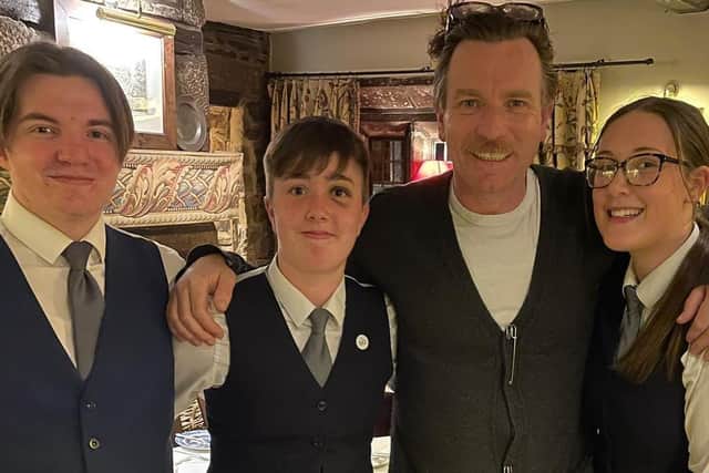 Film star Ewan McGregor with staff at Holdsworth House and Restaurant in Halifax where he stayed recently