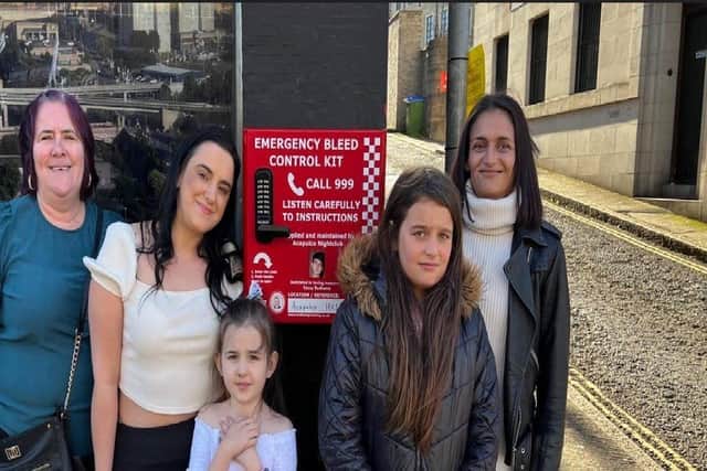 The family of Casey Badhams with the first bleed control box when it was installed at The Acapulco in Halifax: Josie Baldry, Jade Kershaw, Lilah Badhams, Laney Pemberton and Mina Kershaw