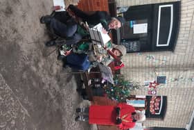 Fundraising carols at Hebden Bridge station
