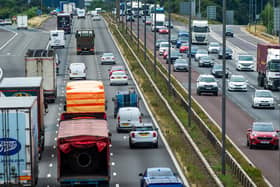 M62 West, smart motorway which is a section of a motorway that uses traffic management methods to increase capacity and reduce congestion in particularly busy areas by using using the hard shoulder as a running lane and using variable speed limits to control the flow of traffic.