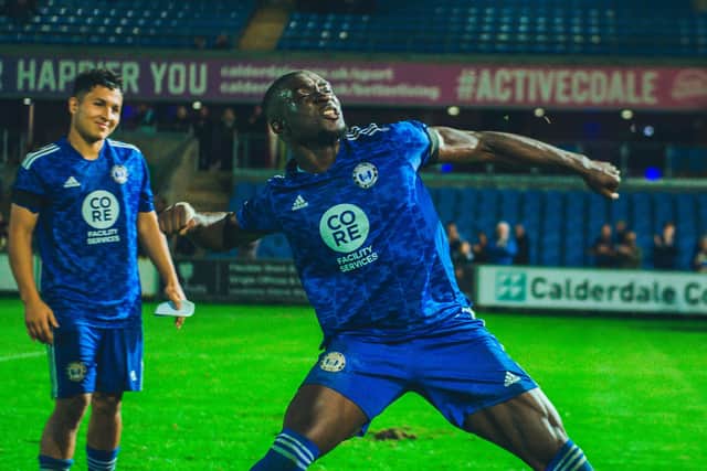 Jesse Debrah about to do his fist-pump celebration after Town's win over Gateshead at The Shay. Photo: Marcus Branston