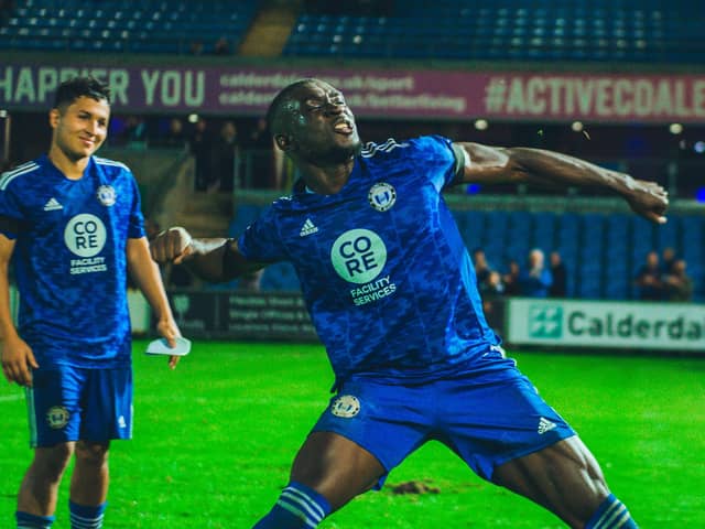 Jesse Debrah about to do his fist-pump celebration after Town's win over Gateshead at The Shay. Photo: Marcus Branston