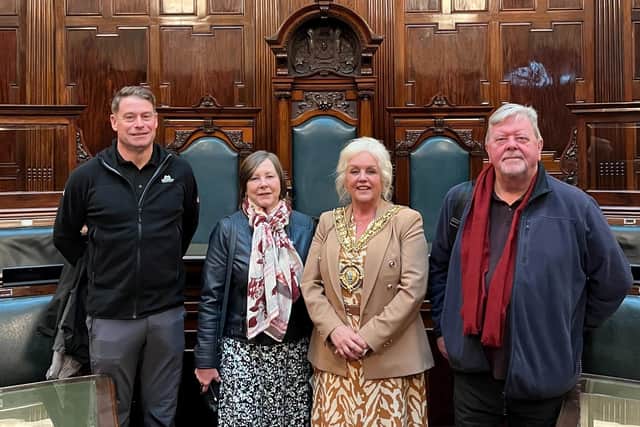 Mayor of Calderdale Angie Gallagher, second right, is pictured with, from the left, Illingworth firefighter and former Royal Marine Commando Kris Whitworth; Halifax Marine David Moffatt’s niece Helen Grady and his nephew, also called David Moffatt, at Halifax Town Hall
