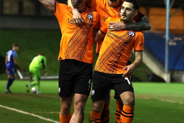 HALIFAX, ENGLAND - MARCH 20: Will Grigg of Chesterfield celebrates scoring his team's first goal with teammates during the Vanarama National League match between FC Halifax Town and Chesterfield at The Shay on March 20, 2024 in Halifax, England.  (Photo by George Wood/Getty Images)