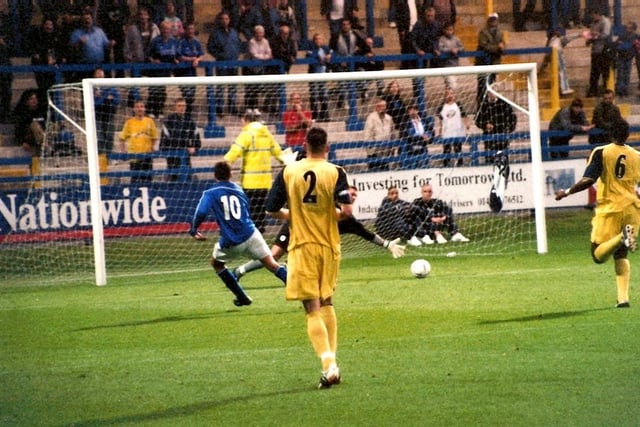 Lewis Killeen shoots against Bolton in a pre-season friendly on July 24, 2003