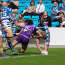 Lachlan Walmsley dives in at the corner for Halifax Panthers against Newcastle at The Shay on Sunday, July 16