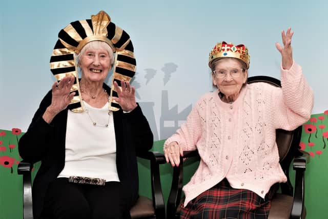 Residents Patricia Moore and Rosalind Wynn having fun bringing history to life. Picture: ANDREW CROZIER