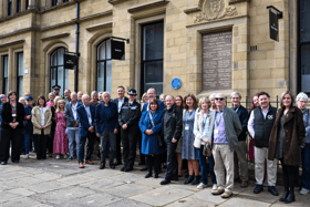 Attendees at the unveiling of a blue plaque in honour of Halifax constable turned crime novelist, Maurice Procter.