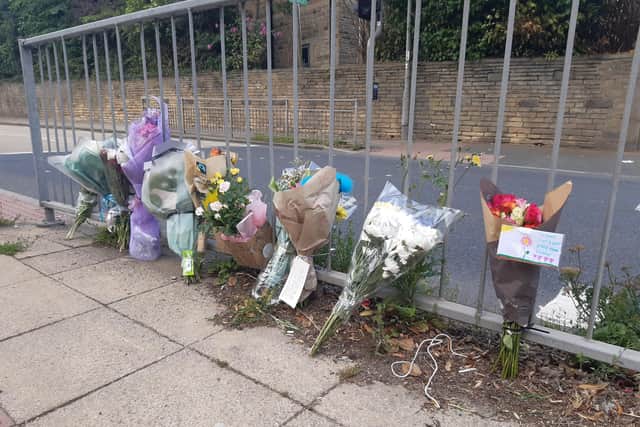 Flowers left for the little girl who died after being hit by a car in Halifax