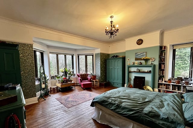 Large bay windows and period fireplaces are features in some of the spacious double bedrooms.