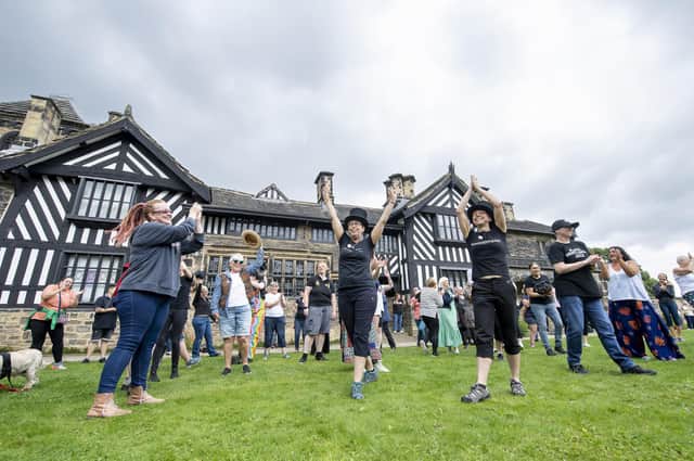The Gentleman Jack flash mob led by Helen Hawkins in front of Shibden Hall.