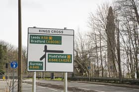 Road sign on Rochdale Road approaching King Cross traffic lights, which says 'Kings Cross' instead of King Cross