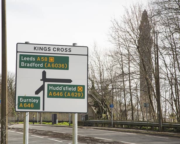 Road sign on Rochdale Road approaching King Cross traffic lights, which says 'Kings Cross' instead of King Cross