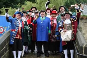 Les Cutts (centre) with other town criers at an event in Hebden Bridge
