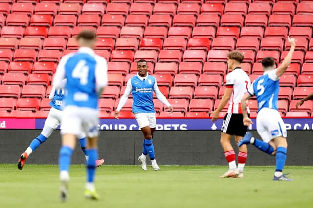 SHEFFIELD, ENGLAND - MAY 24: Adan George celebrates after scoring their side's first goal during the Premier Development League Play Off Final match between Sheffield United U23 and Birmingham City U23 at Bramall Lane on May 24, 2021 in Sheffield, England. (Photo by George Wood/Getty Images)