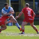 Kevin Larroyer is tackled during the Betfred Championship match between Halifax Panthers and Sheffield Eagles at the Shay Stadium. Photo by Simon Hall.