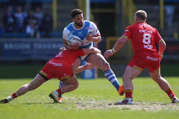 Kevin Larroyer is tackled during the Betfred Championship match between Halifax Panthers and Sheffield Eagles at the Shay Stadium. Photo by Simon Hall.