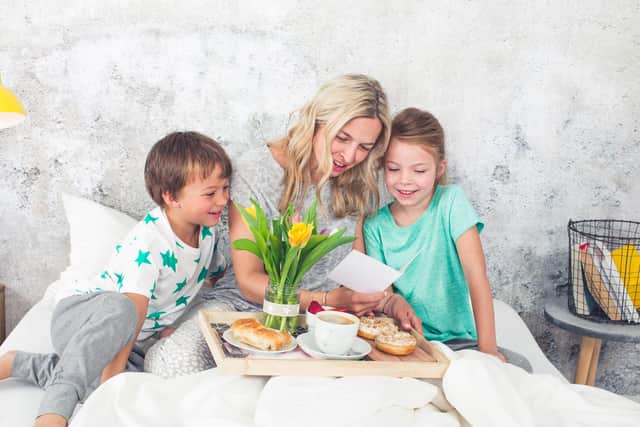 Surprise your mum with breakfast in bed. Photo: Adobe