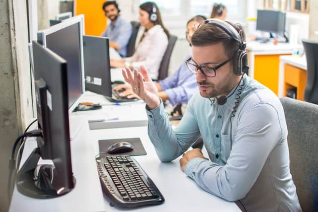 Staffing issues were discussed by Calderdale councillors. Picture: generic office workers/call centre - Adobe Stock