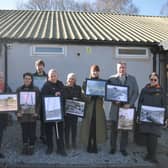 Pictured from the left are recipients of artwork, VBA representatives and members of the community including flood wardens – the Rev Cathy Reardon, Alison Carlton, Katie Kimber, Coun Scott Patient, Francis Charlton, Sue Slater, Serah Stooks, Julian Wilson and Eloise Charlton